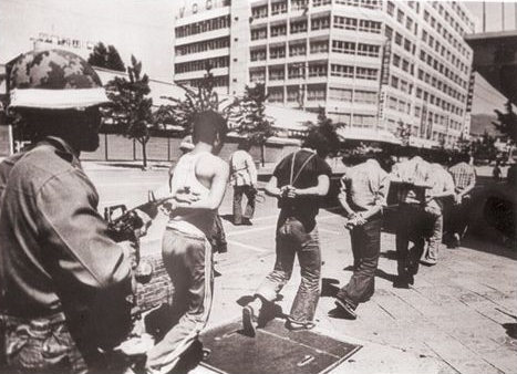 1980년 5월27일 5.18최후항쟁지였던 전남도청에서 계엄군에게 진압 당한 시민군이 체포돼 이송되고 있다. ⓒ5.18기념재단 제공
